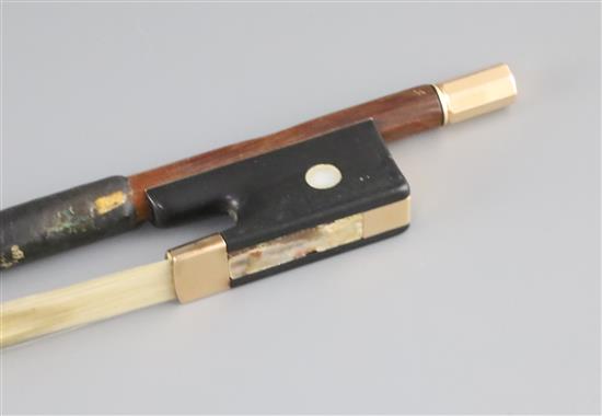 A German gold mounted violin bow, 19th century, length 74cm, weight 59g.